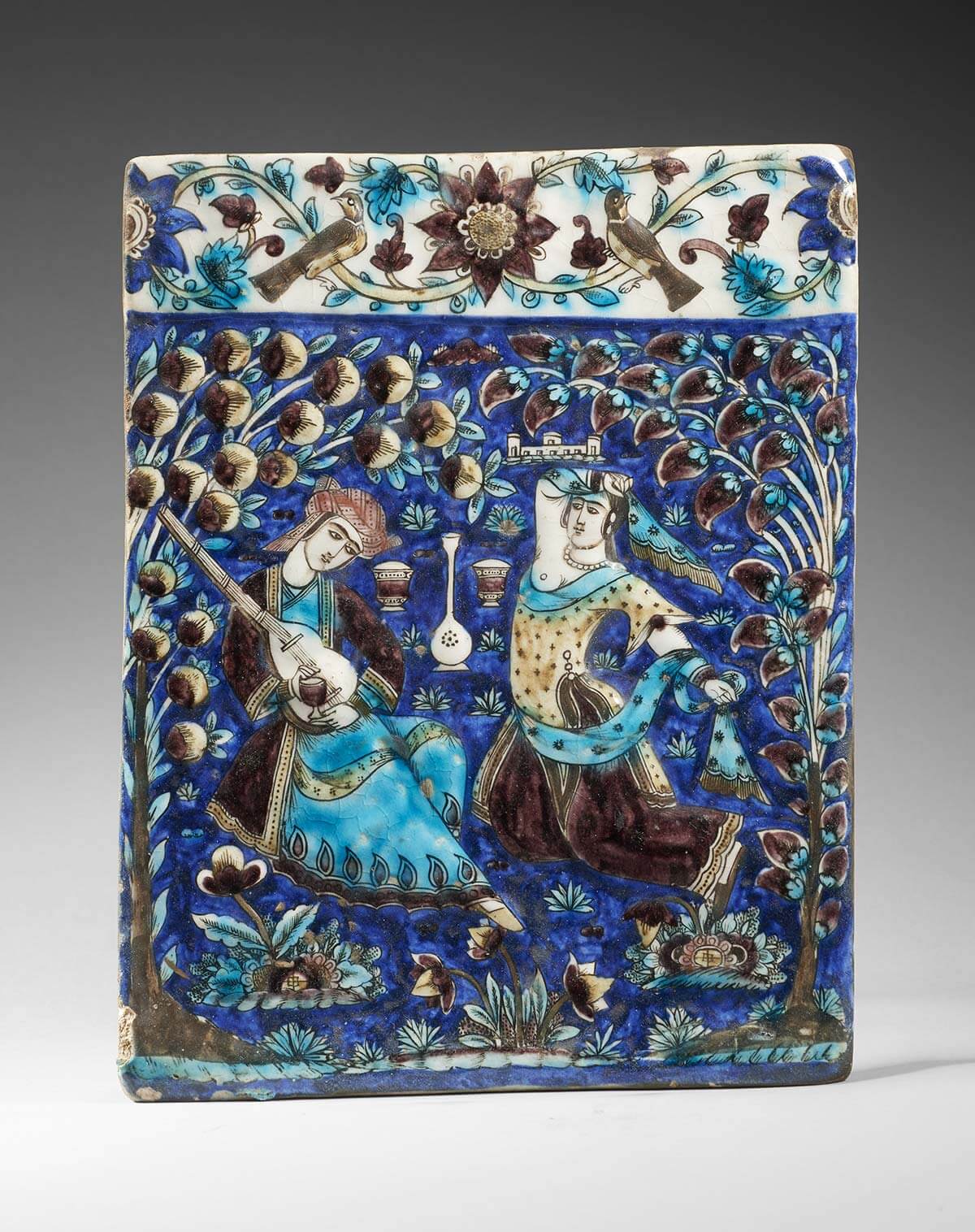 Qajar tile with musician and dancer